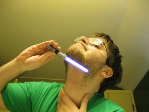 Man Shaving With Lightsaber Funny Laser Image
